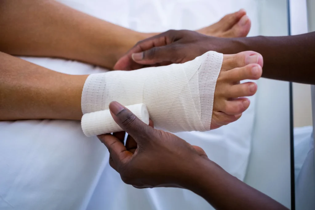 applying bandage to foot in medical setting 2026 01 09 09 54 05 utc ZNmPXyGjO8T4JJKbDU5gXRBvGJwRSJ